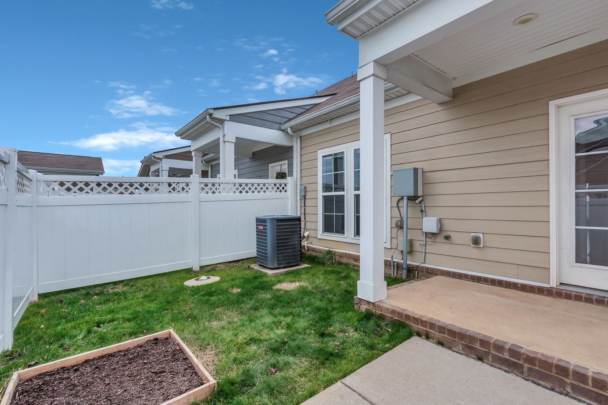 305 Dursley Lane Spring Hill, TN 37174 - Photo 23 of 25 a front view of a house with a yard