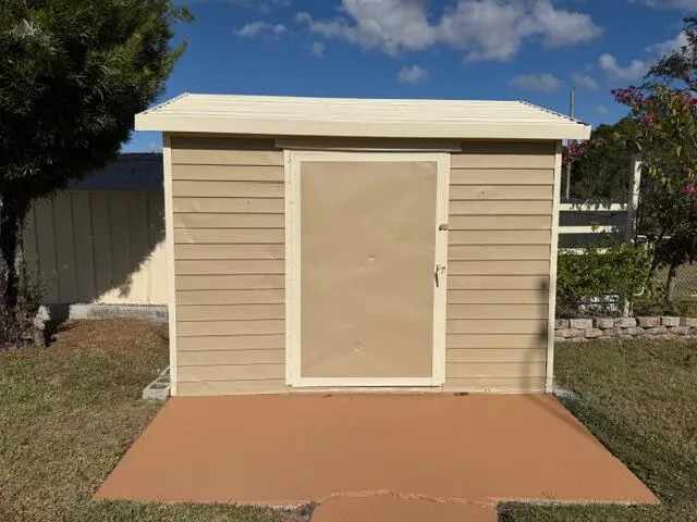 a view of a house with a garage