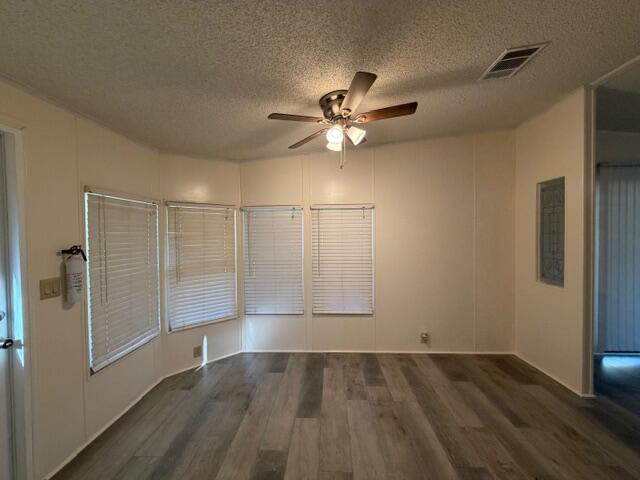 340 Hickory Ridge Drive Sebring, FL 33876 - Photo 3 of 21 wooden floor in an empty room with a window