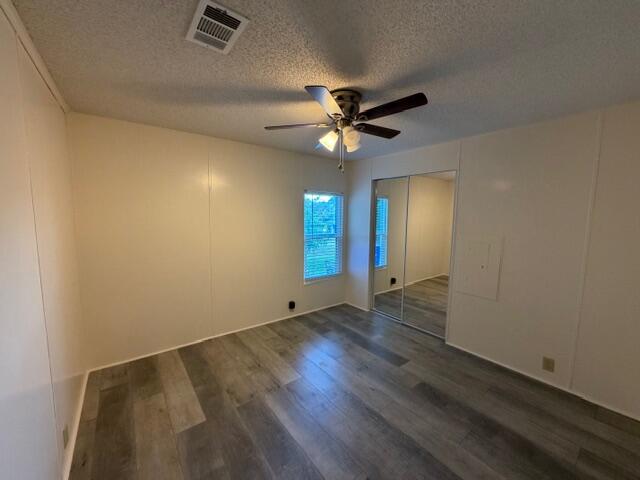 340 Hickory Ridge Drive Sebring, FL 33876 - Photo 9 of 21 a view of an empty room with window and wooden floor