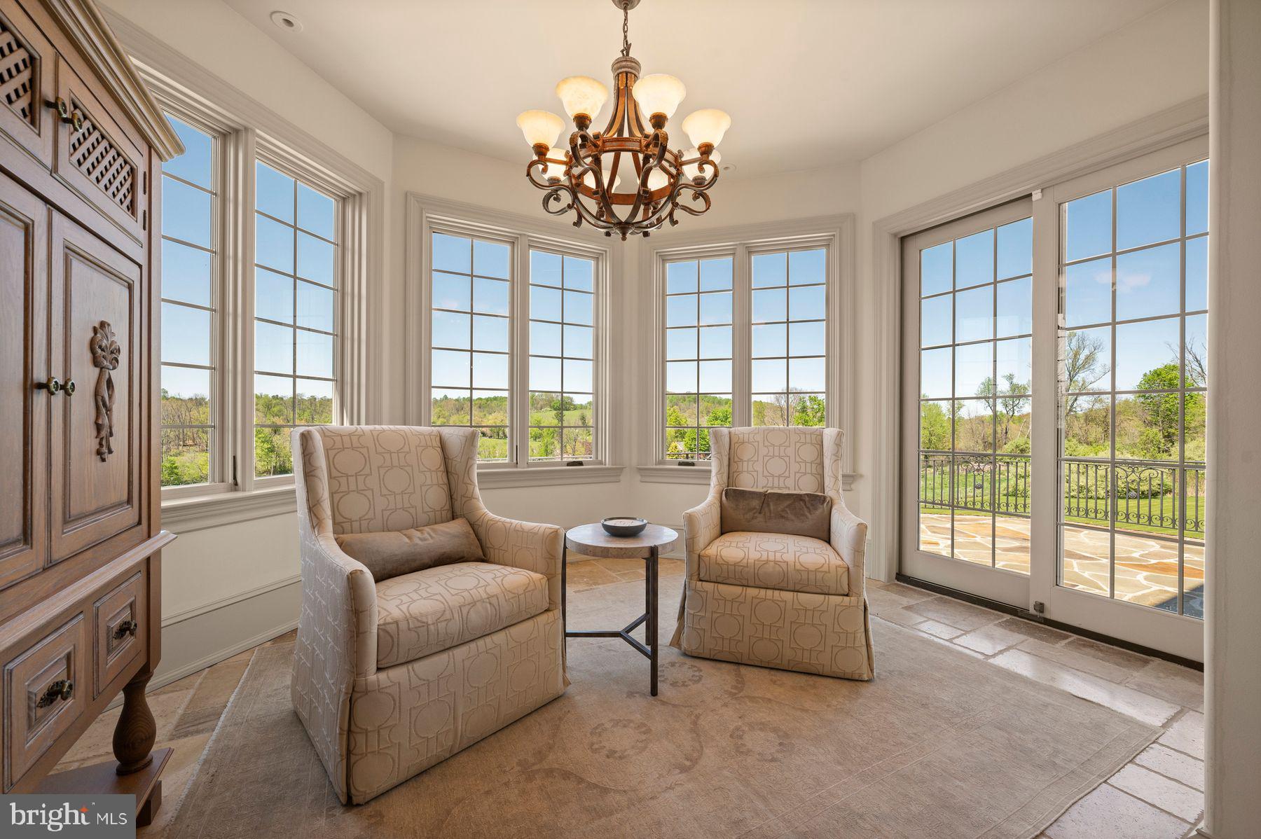925 Drovers Lane Chester Springs, PA 19425 - Photo 25 of 96 a living room with furniture and a large window