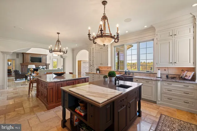a bedroom with a bed couch and window