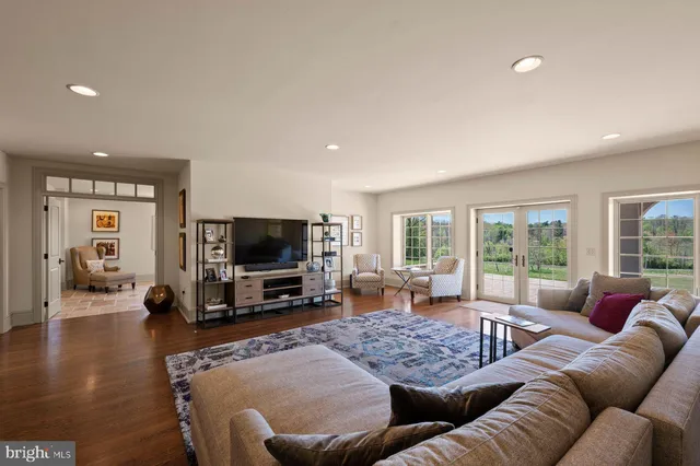 a picture of a room with a floor to ceiling window