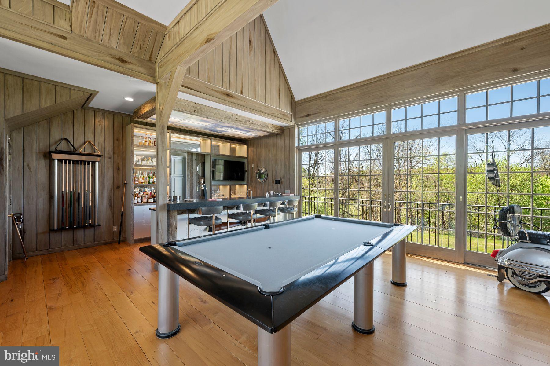 925 Drovers Lane Chester Springs, PA 19425 - Photo 61 of 96 a view of a dining room with furniture window and wooden floor