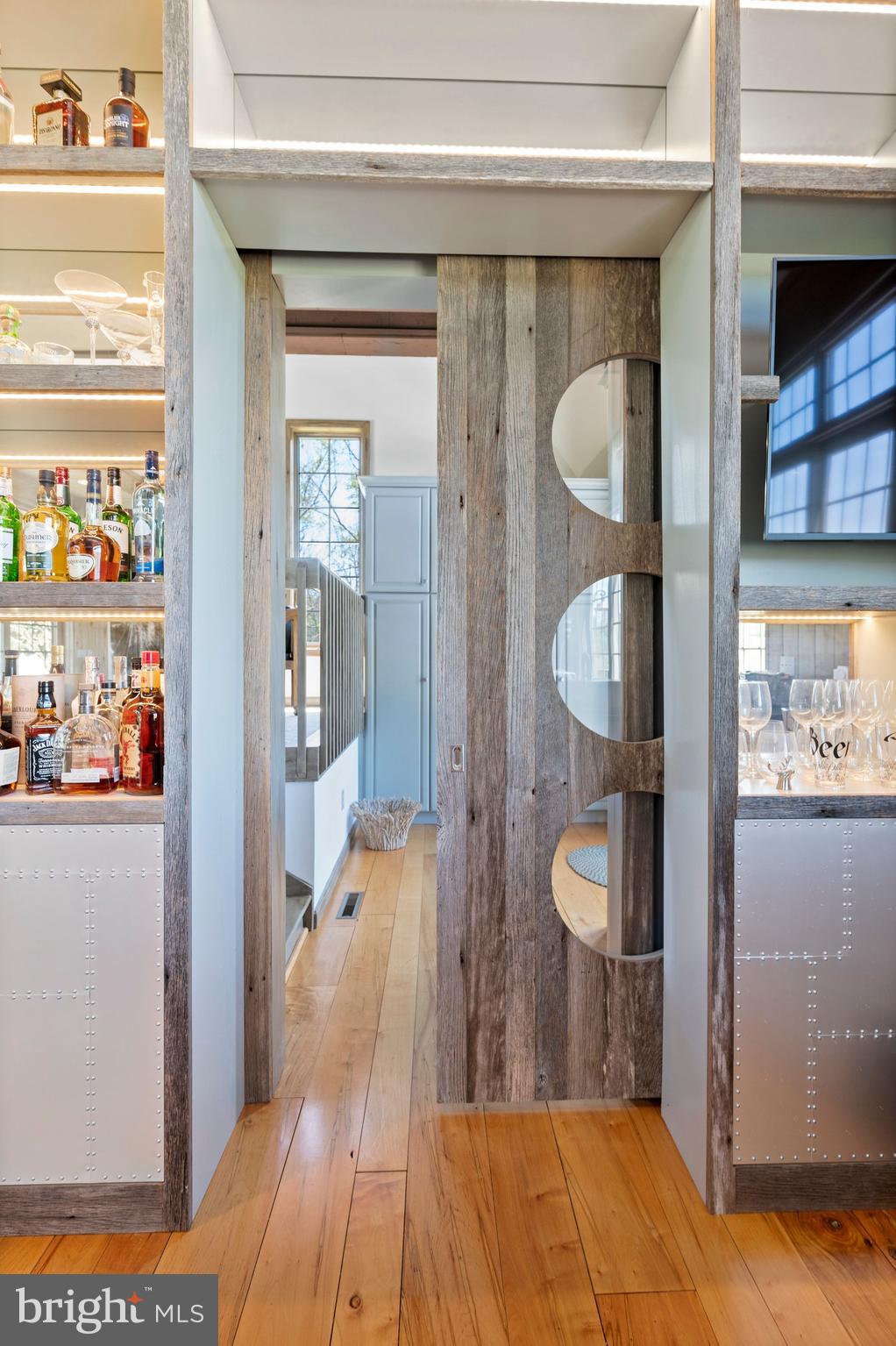 925 Drovers Lane Chester Springs, PA 19425 - Photo 65 of 96 Pocket Doors from bar to eating area