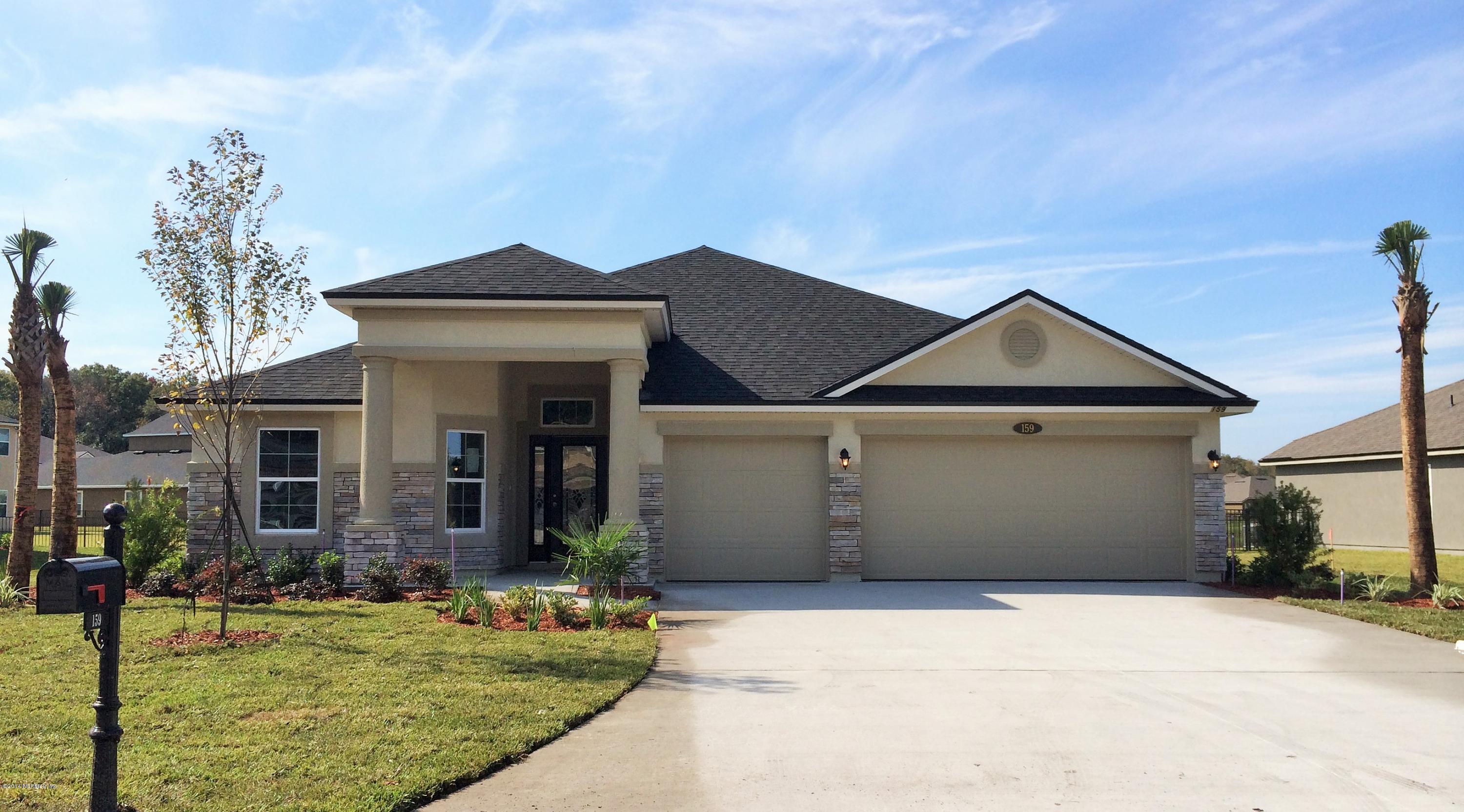 159 Prince Albert Avenue St. Johns, FL 32259 - Photo 1 of 43 a front view of a house with garden