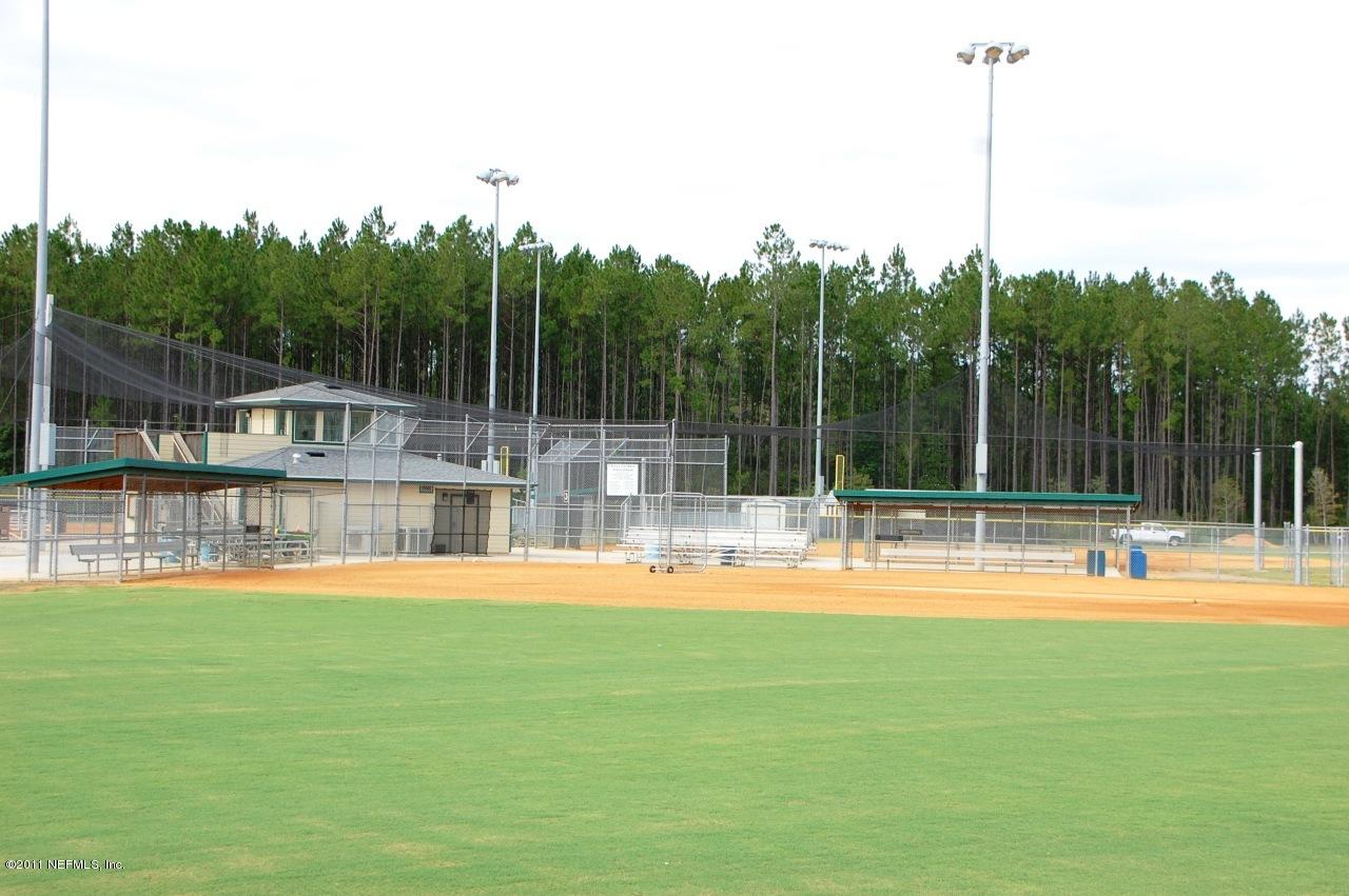 159 Prince Albert Avenue St. Johns, FL 32259 - Photo 10 of 43 a view of a swimming pool with a yard and sitting area