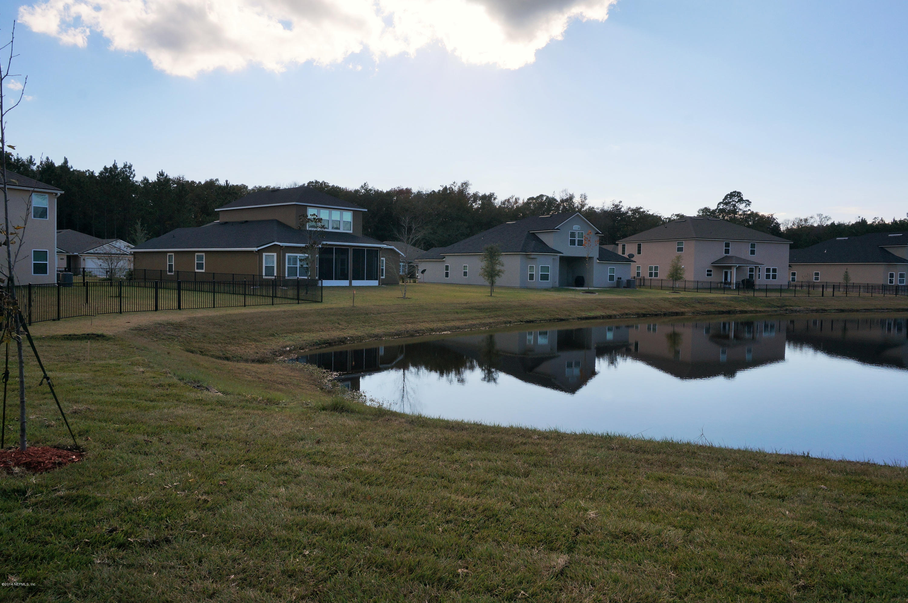 159 Prince Albert Avenue St. Johns, FL 32259 - Photo 41 of 43 a view of a lake with a big yard