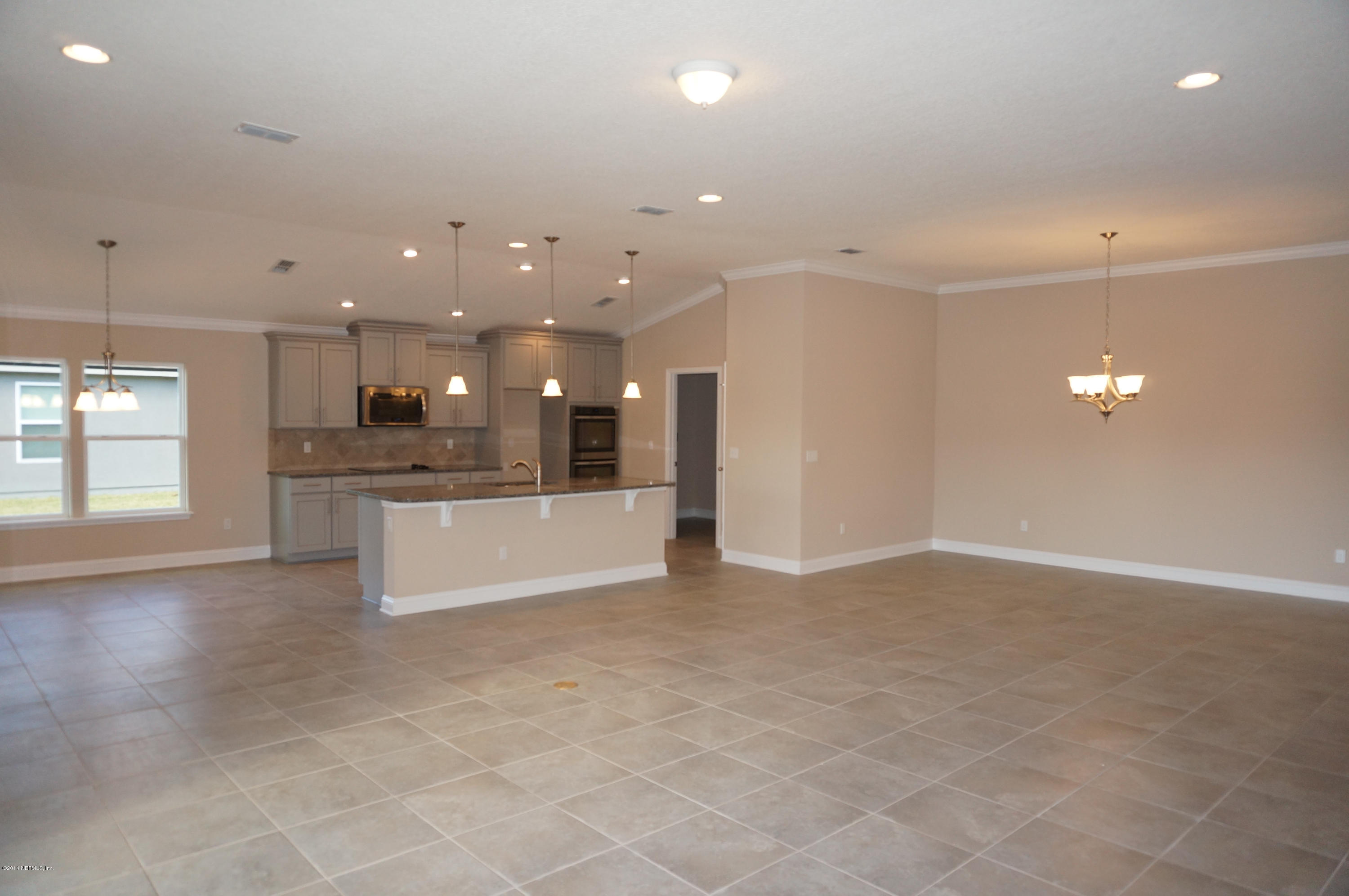 159 Prince Albert Avenue St. Johns, FL 32259 - Photo 42 of 43 a view of kitchen with kitchen island and stainless steel appliances