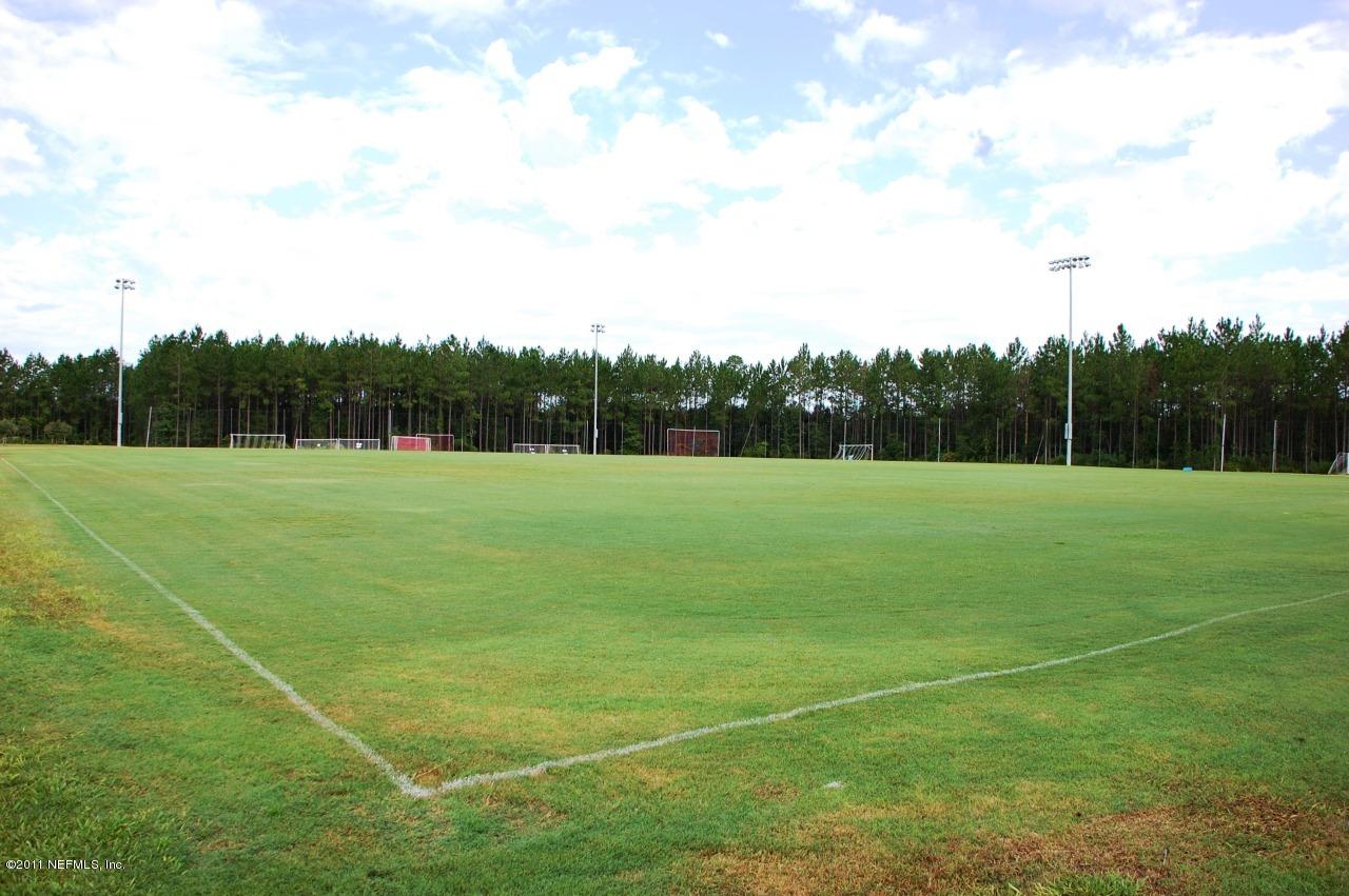 159 Prince Albert Avenue St. Johns, FL 32259 - Photo 6 of 43 a view of a field with a big yard