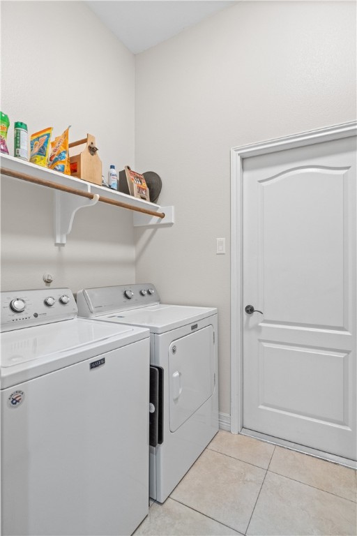 6934 Wooldridge Road, Unit K Corpus Christi, TX 78414 - Photo 10 of 20 a utility room with dryer and washer