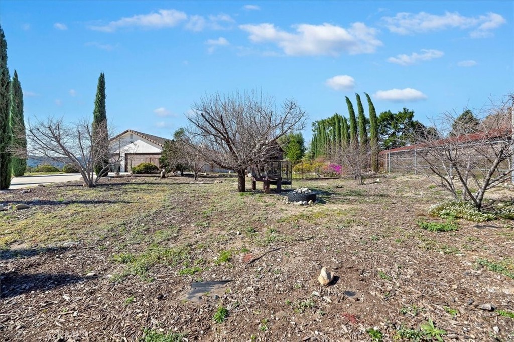 923 Devore Road San Bernardino, CA 92407 - Photo 42 of 65 a view of a house with a yard