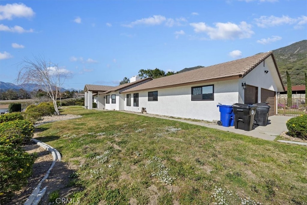 923 Devore Road San Bernardino, CA 92407 - Photo 56 of 65 a view of a house with backyard and sitting area