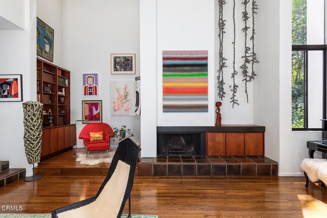 a room with furniture and a fireplace