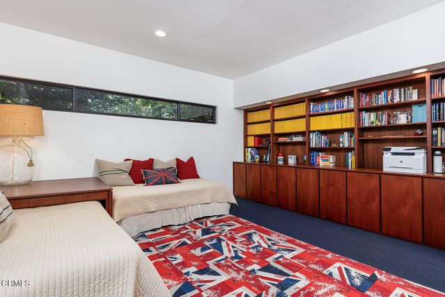 a living room with furniture and window