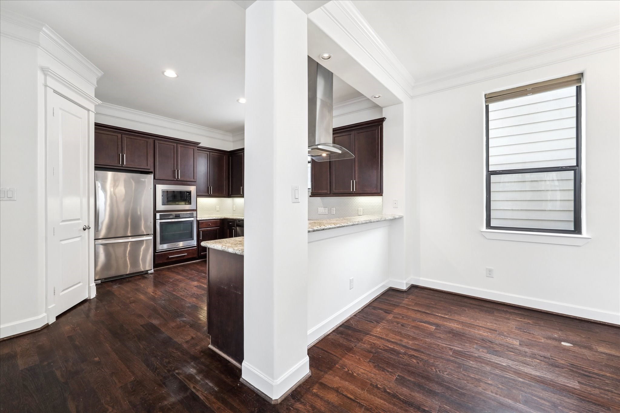 830 West 19th Street, Unit B Houston, TX 77008 - Photo 13 of 38 a view of kitchen with stainless steel appliances wooden floor and electronic appliances