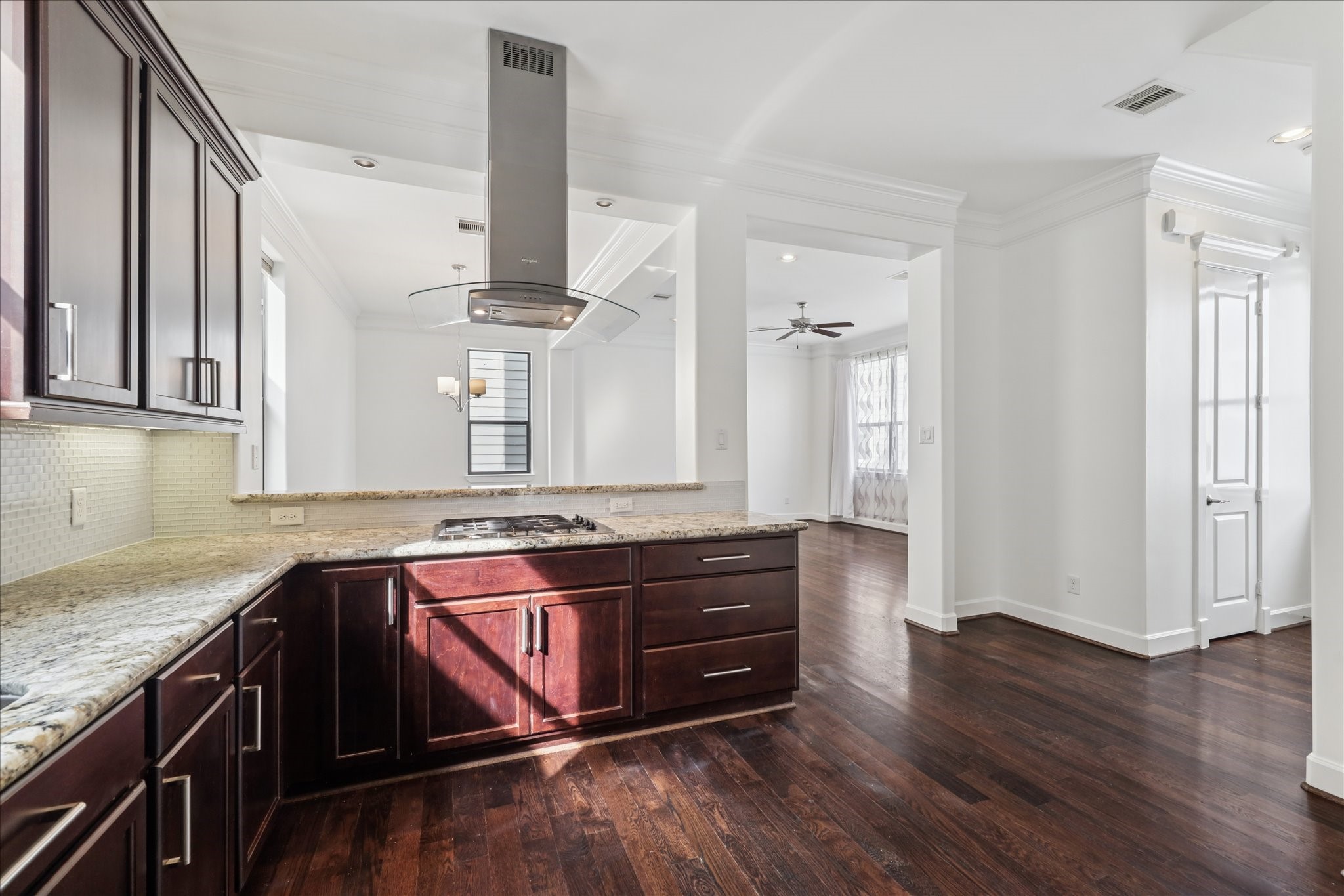 830 West 19th Street, Unit B Houston, TX 77008 - Photo 16 of 38 a kitchen with stainless steel appliances granite countertop a stove a sink and a refrigerator
