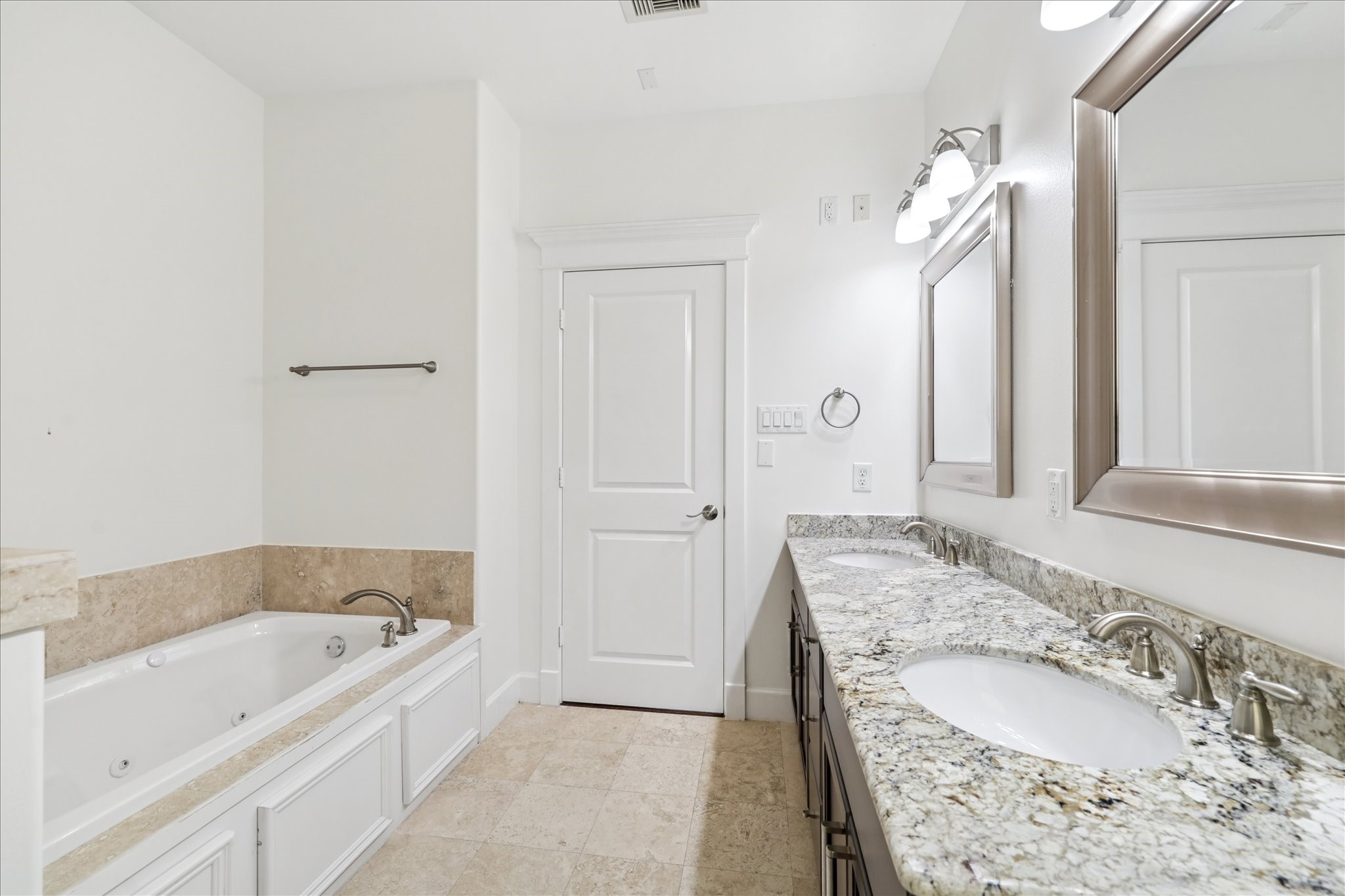 830 West 19th Street, Unit B Houston, TX 77008 - Photo 23 of 38 a bathroom with a granite countertop tub sink and mirror