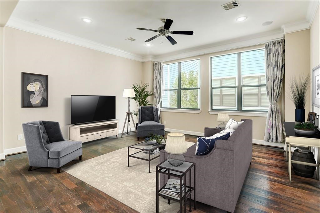 830 West 19th Street, Unit B Houston, TX 77008 - Photo 8 of 38 a living room with furniture a flat screen tv and a large window