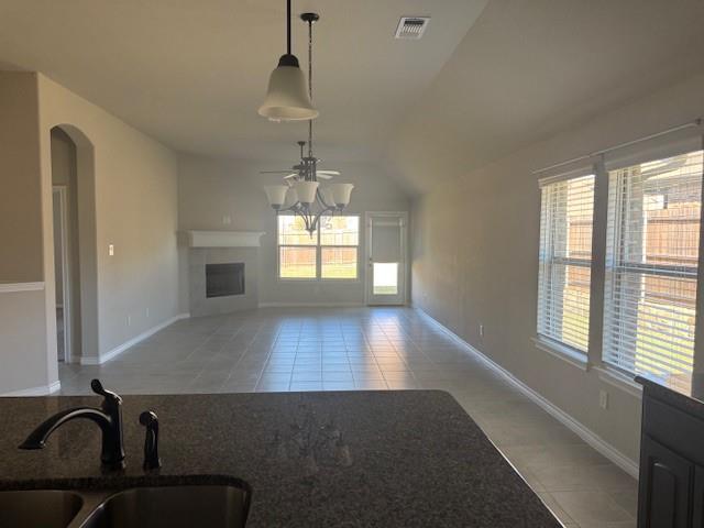 7208 Windy Ridge Drive Fort Worth, TX 76123 - Photo 3 of 13 a view of a room with a ceiling fan and window