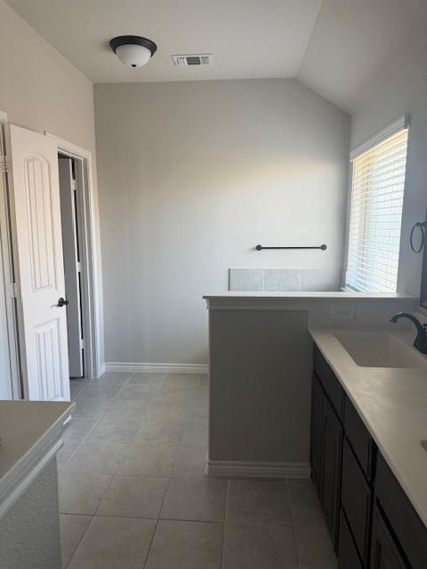 7208 Windy Ridge Drive Fort Worth, TX 76123 - Photo 9 of 13 a kitchen with a sink and a refrigerator