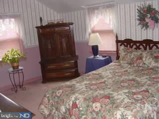 1425 Steel Road Havertown, PA 19083 - Photo 5 of 6 a bedroom with a bed and a window