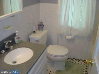 1425 Steel Road Havertown, PA 19083 - Photo 6 of 6 a bathroom with a sink toilet and shower