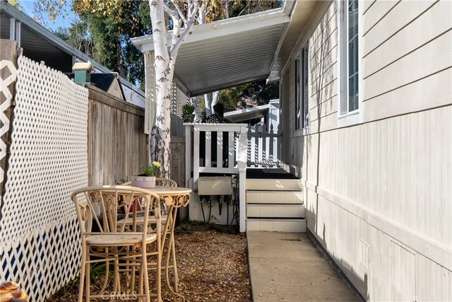 a view of a porch with furniture