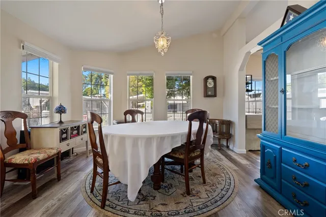 a view of a dining room with furniture window and outside view