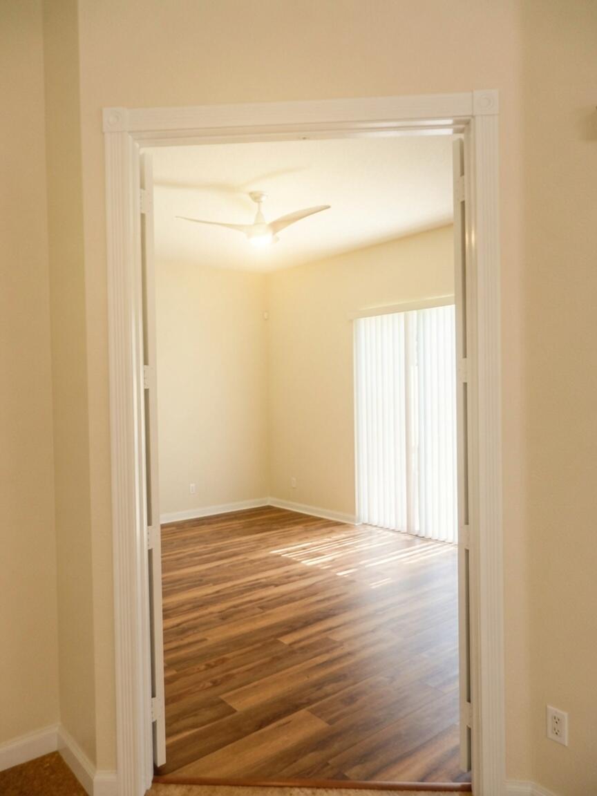 11547 Southwest Rockingham Drive Port St. Lucie, FL 34987 - Photo 12 of 45 Primary Bedroom entrance grok
