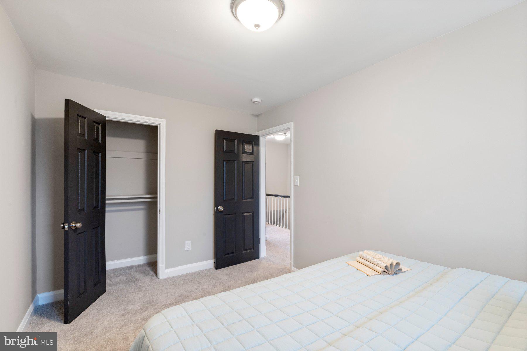 1659 Thetford Road Towson, MD 21286 - Photo 15 of 25 a bedroom with a bed and cabinets