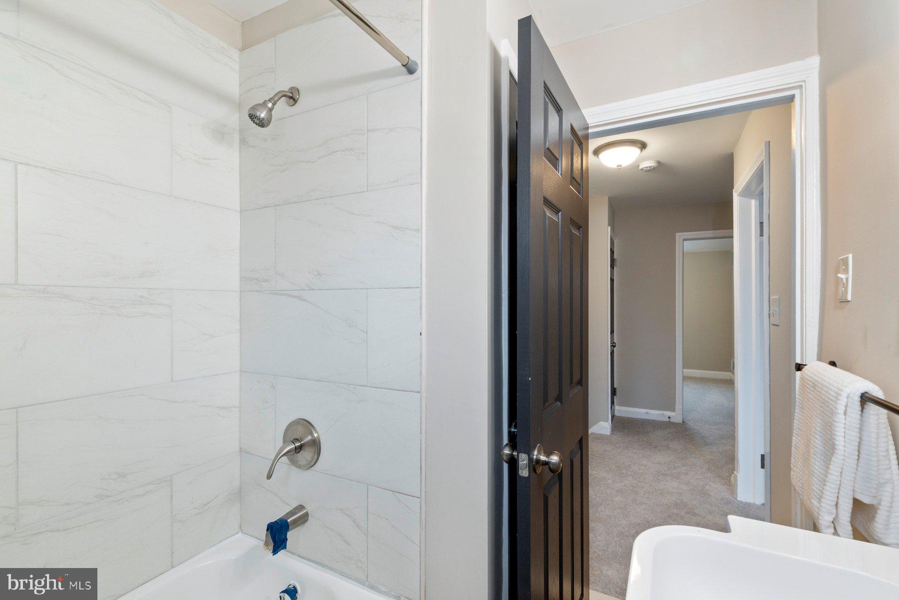 1659 Thetford Road Towson, MD 21286 - Photo 19 of 25 a bathroom with a shower and toilet