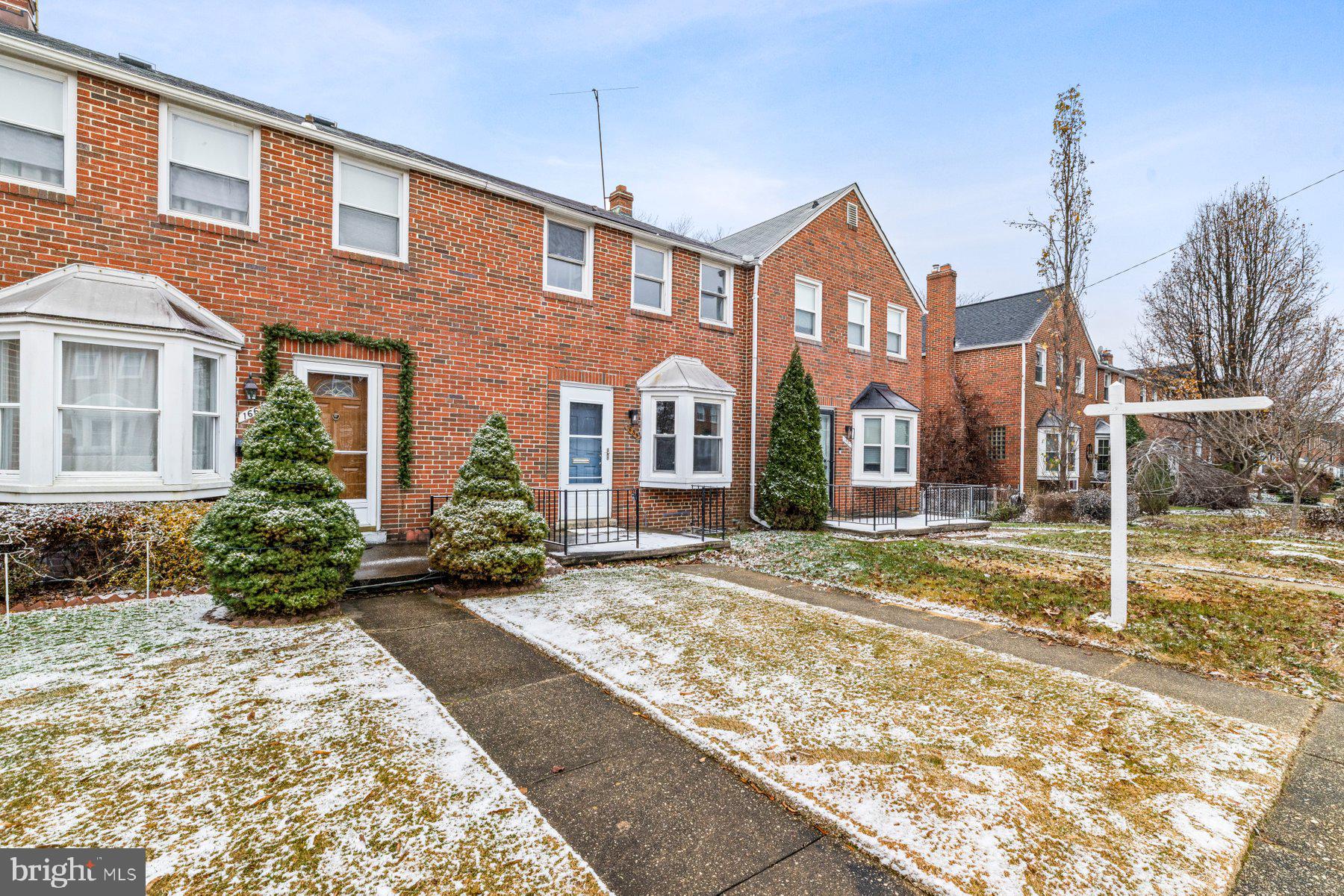 1659 Thetford Road Towson, MD 21286 - Photo 2 of 25 a front view of a house with garden