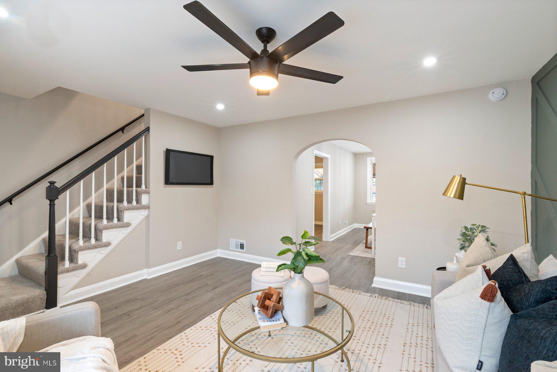 1659 Thetford Road Towson, MD 21286 - Photo 4 of 25 a living room with furniture and a potted plant