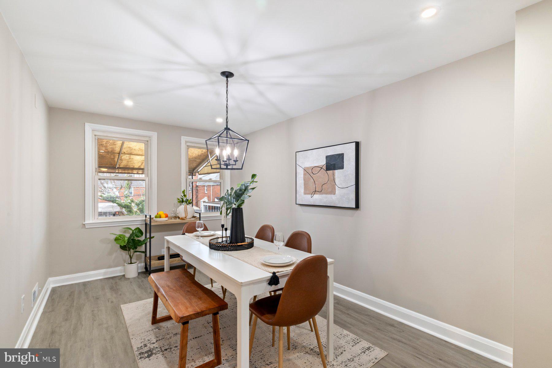 1659 Thetford Road Towson, MD 21286 - Photo 6 of 25 a view of a dining room with furniture window and wooden floor