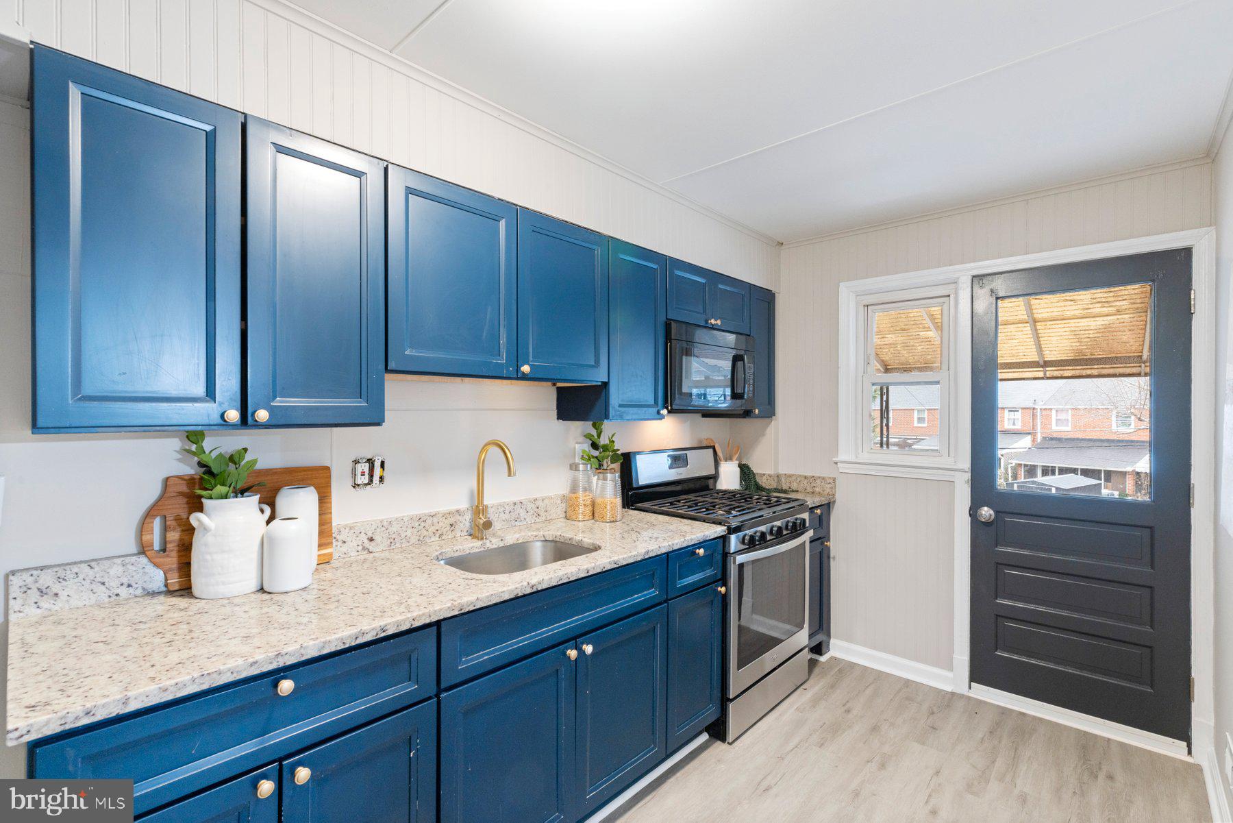 1659 Thetford Road Towson, MD 21286 - Photo 9 of 25 a kitchen with a refrigerator stove and sink