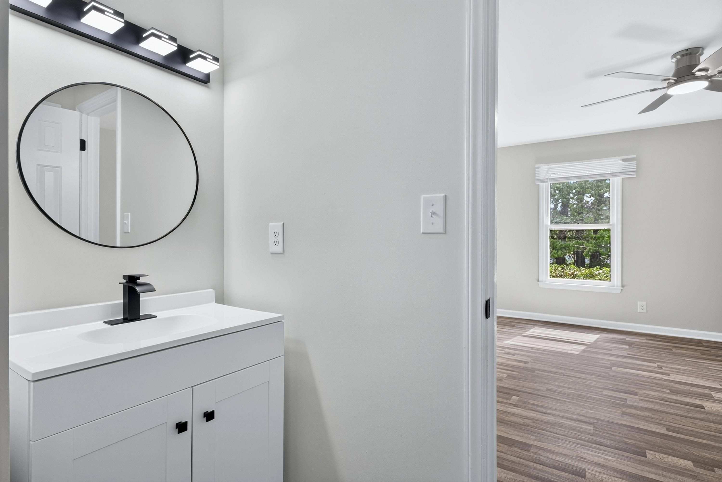 708 Powell Drive, Unit A Raleigh, NC 27606 - Photo 30 of 56 Primary bath looking to BR