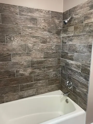 a bathroom with a bathtub