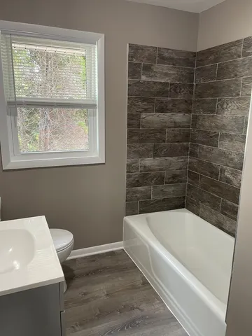 a bathroom with a bathtub