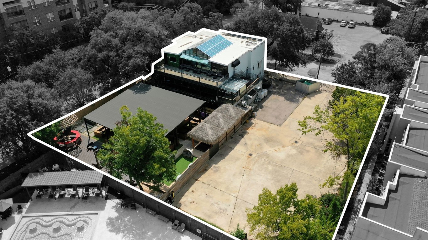 1916 Baldwin Street Houston, TX 77019 - Photo 2 of 37 an aerial view of house with yard and mountain view