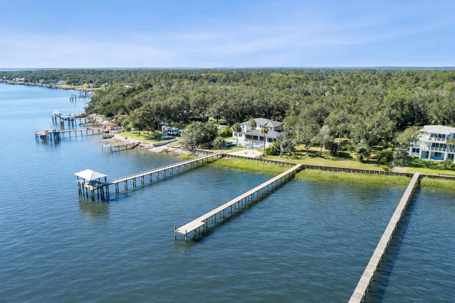 16385 Waterville Road Jacksonville, FL 32226 - Photo 1 of 11 a view of a swimming pool with seating area and mountain view