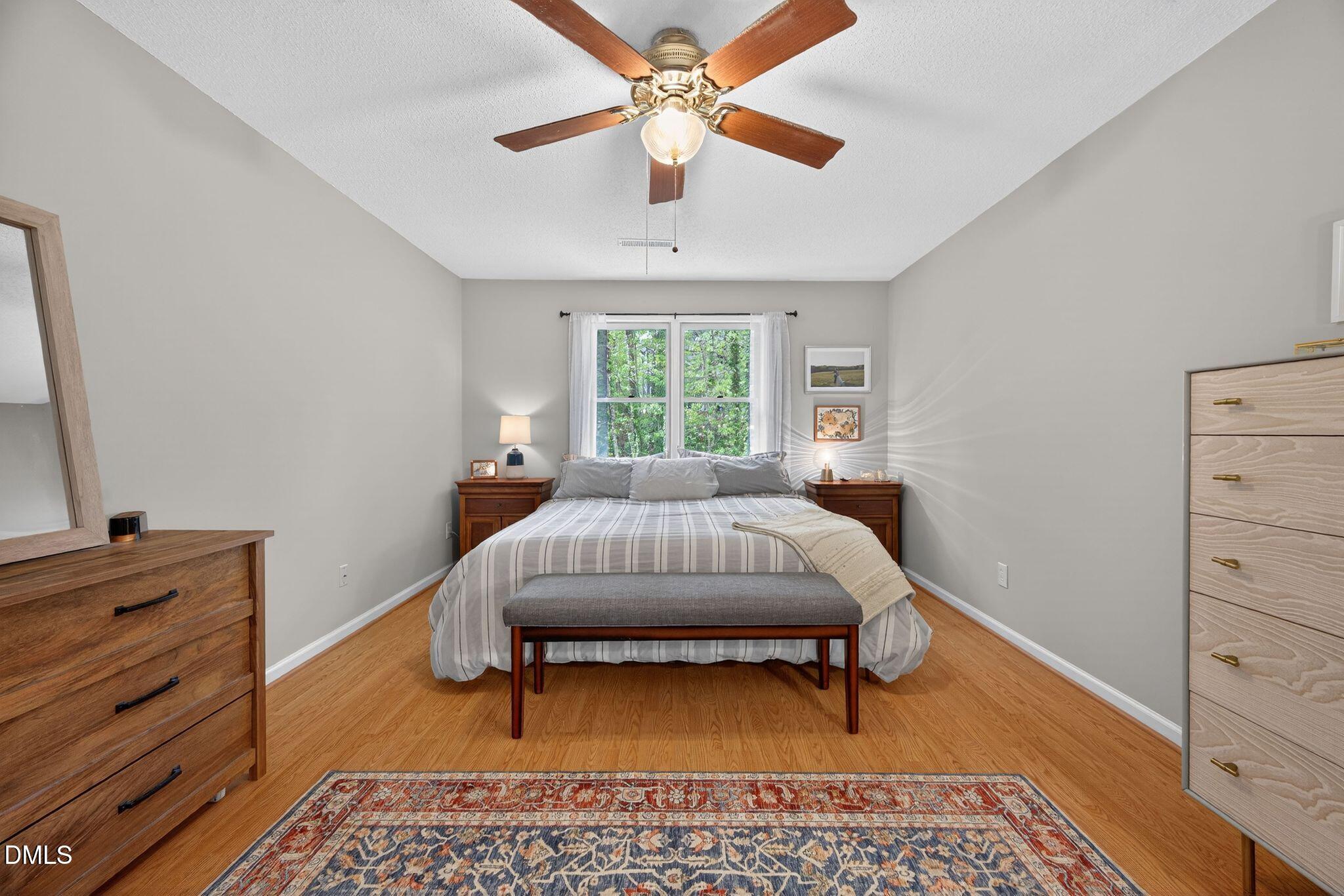3838 Carnegie Lane Raleigh, NC 27612 - Photo 16 of 40 45_14-3838-carnegie-ln-primary-bedroom