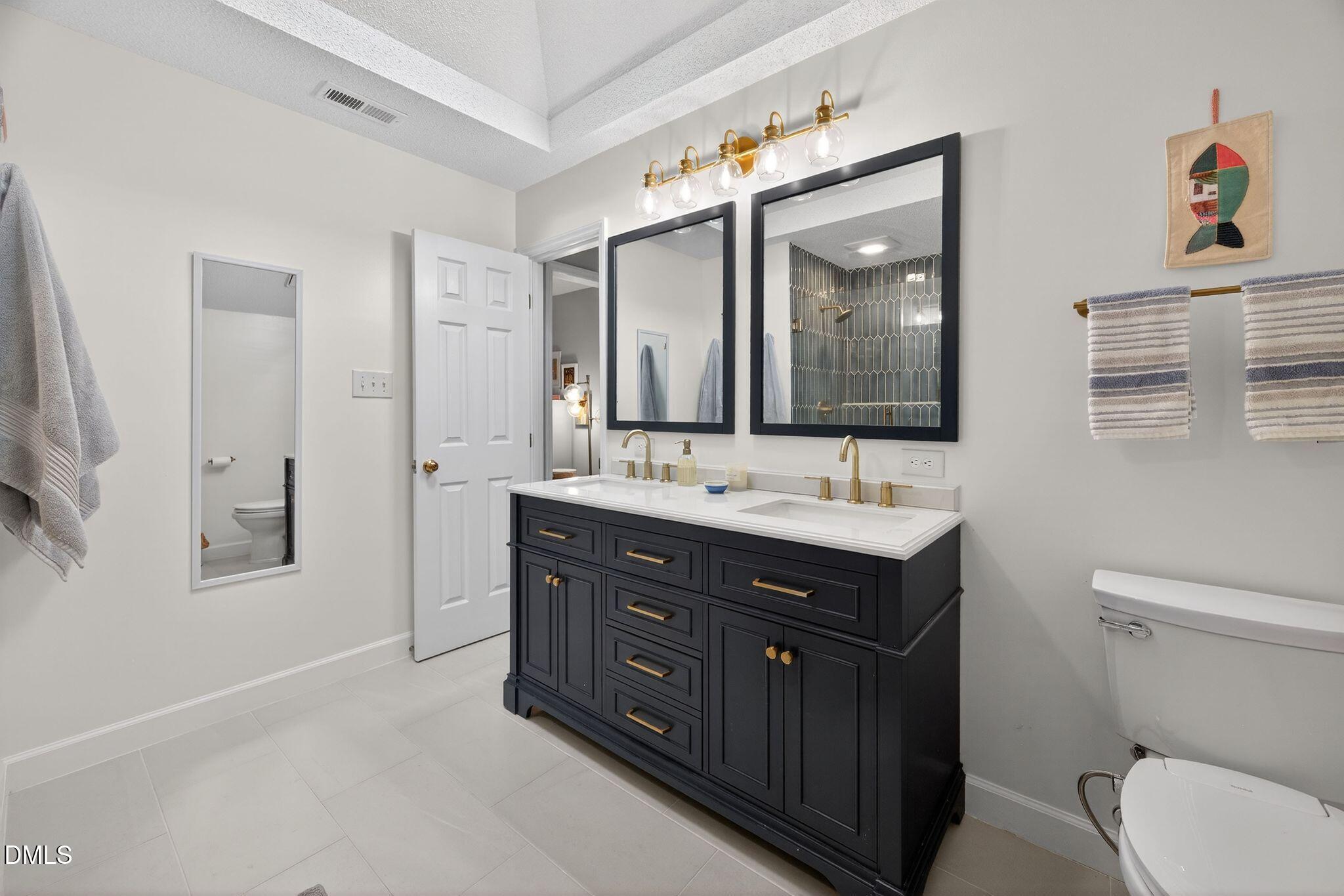 3838 Carnegie Lane Raleigh, NC 27612 - Photo 19 of 40 48_17-3838-carnegie-ln-primary-bathroom