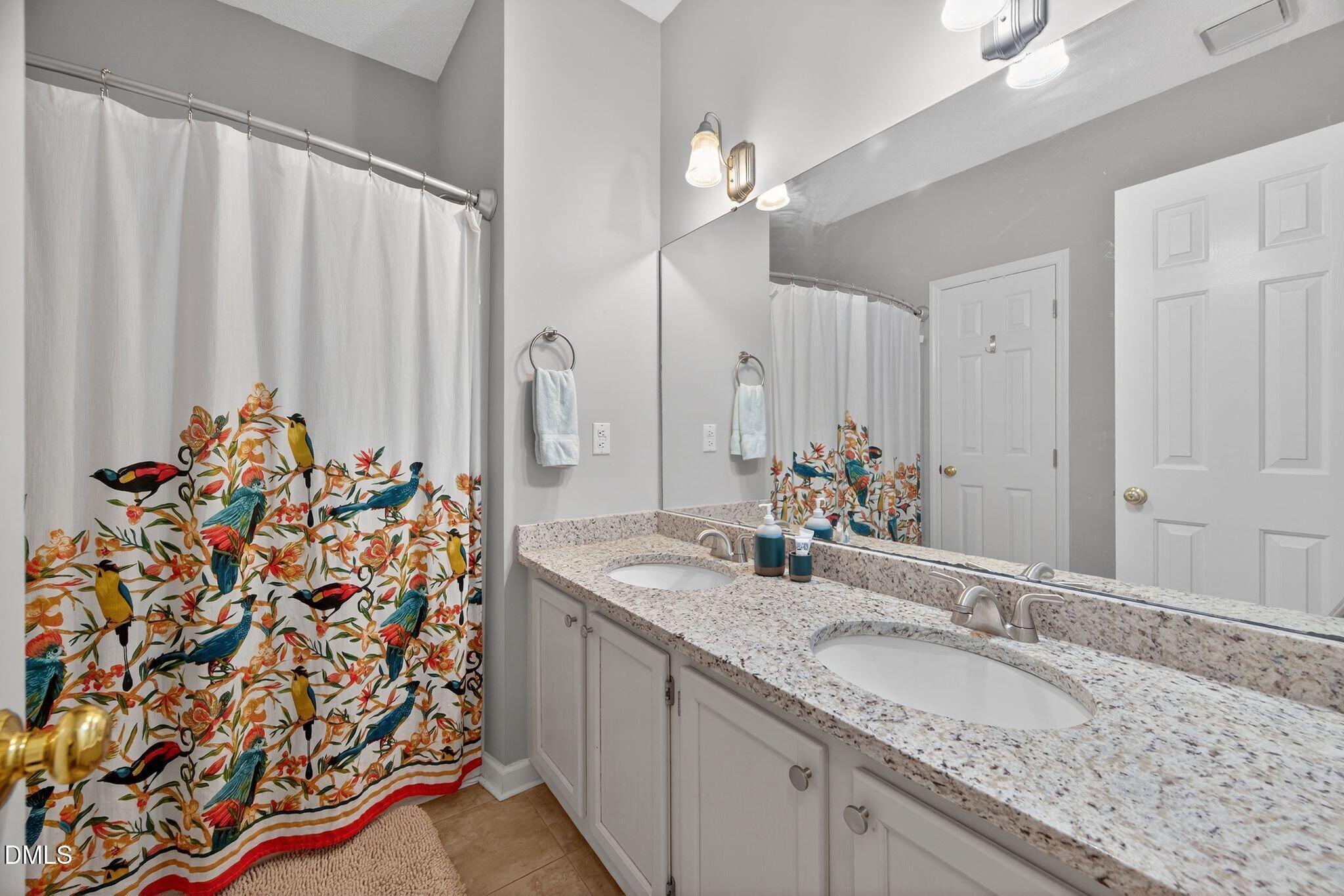 3838 Carnegie Lane Raleigh, NC 27612 - Photo 26 of 40 53_22-3838-carnegie-ln-bathroom-2