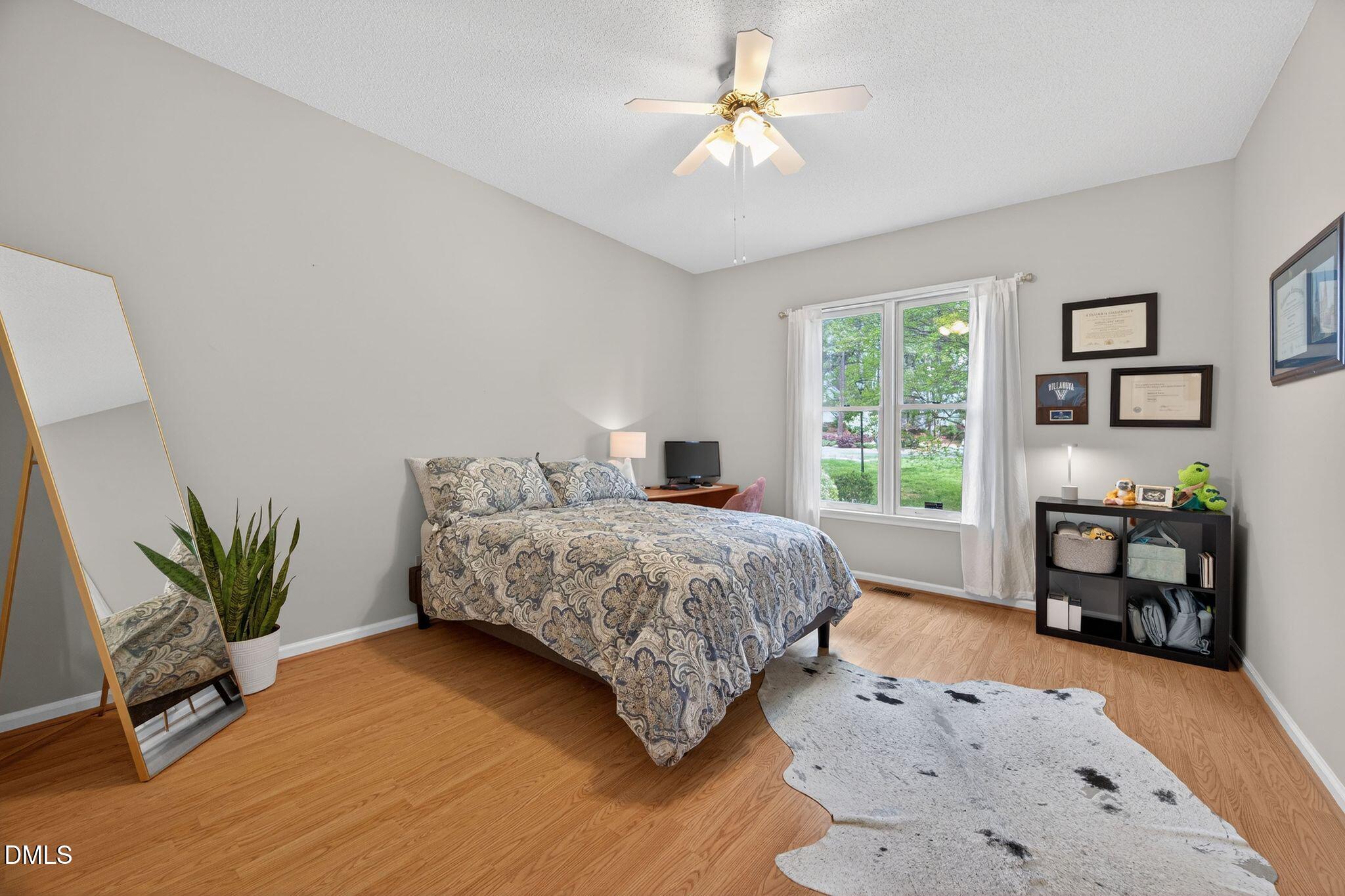 3838 Carnegie Lane Raleigh, NC 27612 - Photo 27 of 40 59_28-3838-carnegie-ln-bedroom-3