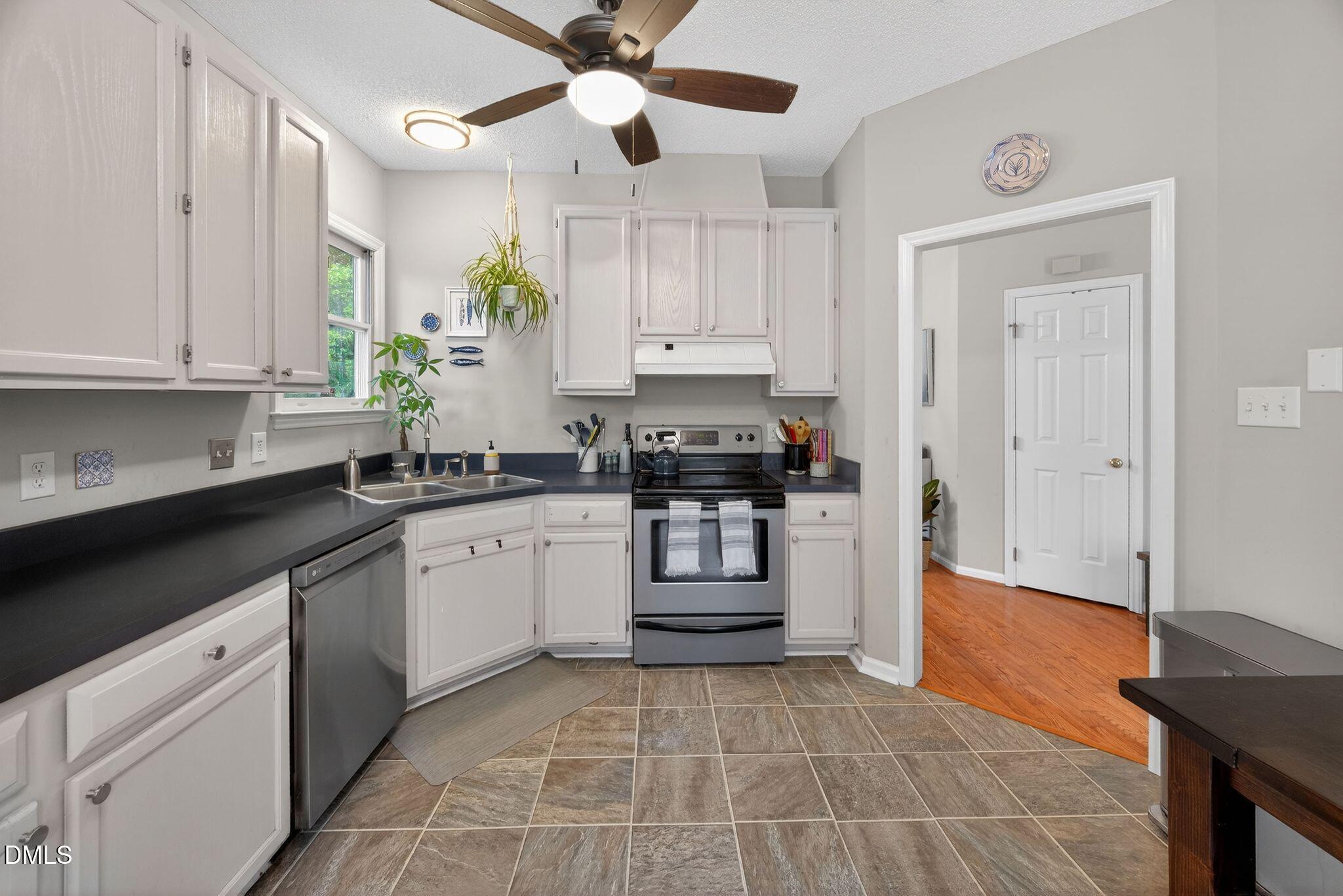 3838 Carnegie Lane Raleigh, NC 27612 - Photo 9 of 40 39_08-3838-carnegie-ln-kitchen