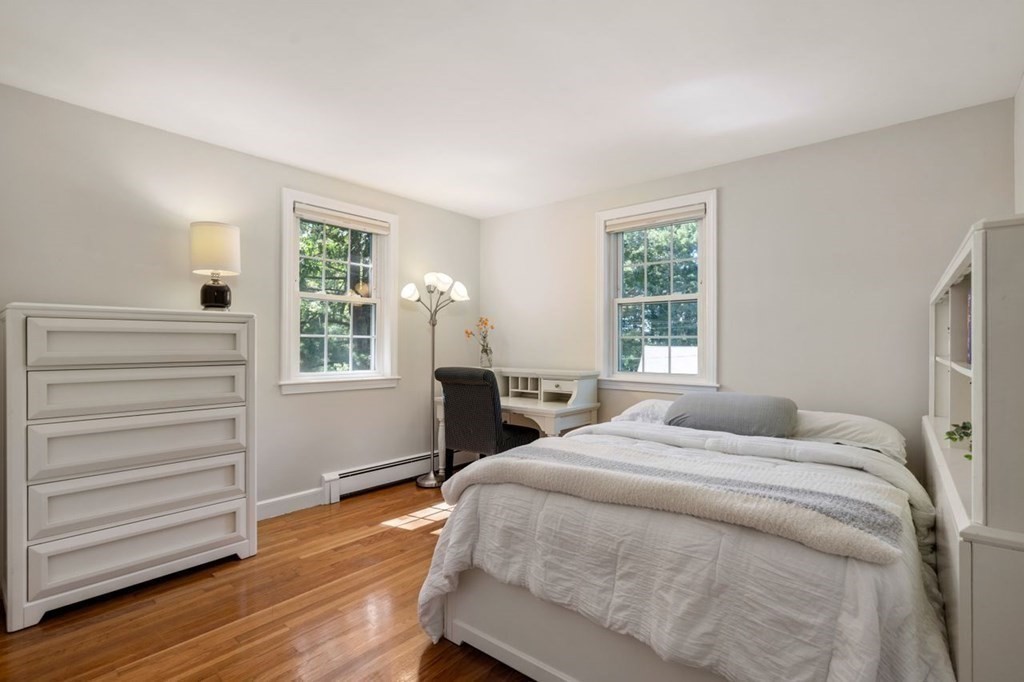 8 Oak Hill Road Wayland, MA 01778 - Photo 21 of 38 a bedroom with a bed and a window