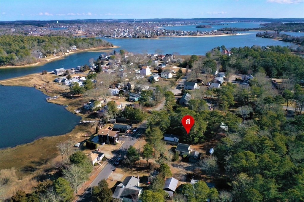 2 Helminth Avenue Wareham, MA 02571 - Photo 2 of 38 an aerial view of a house with a yard and lake view