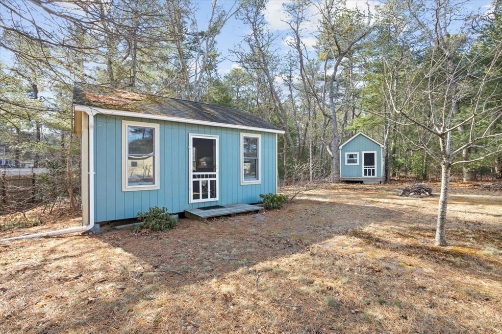2 Helminth Avenue Wareham, MA 02571 - Photo 26 of 38 a house with trees in front of it