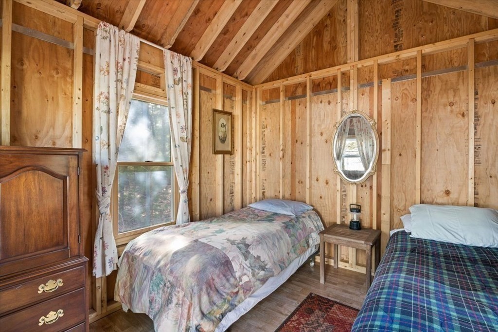 2 Helminth Avenue Wareham, MA 02571 - Photo 30 of 38 a bed sitting in a balcony next to a window